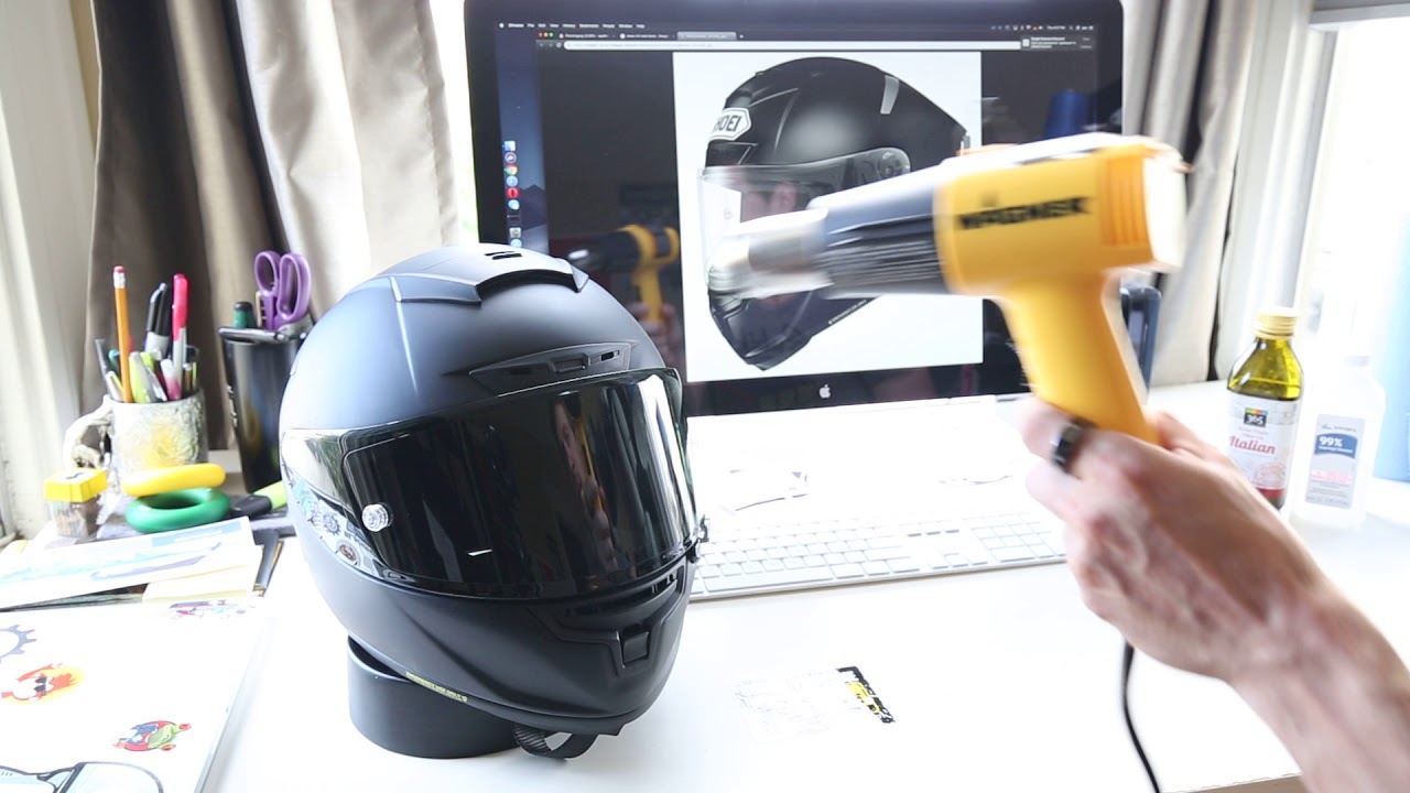 Casque moto chauffé par un sèche-cheveux